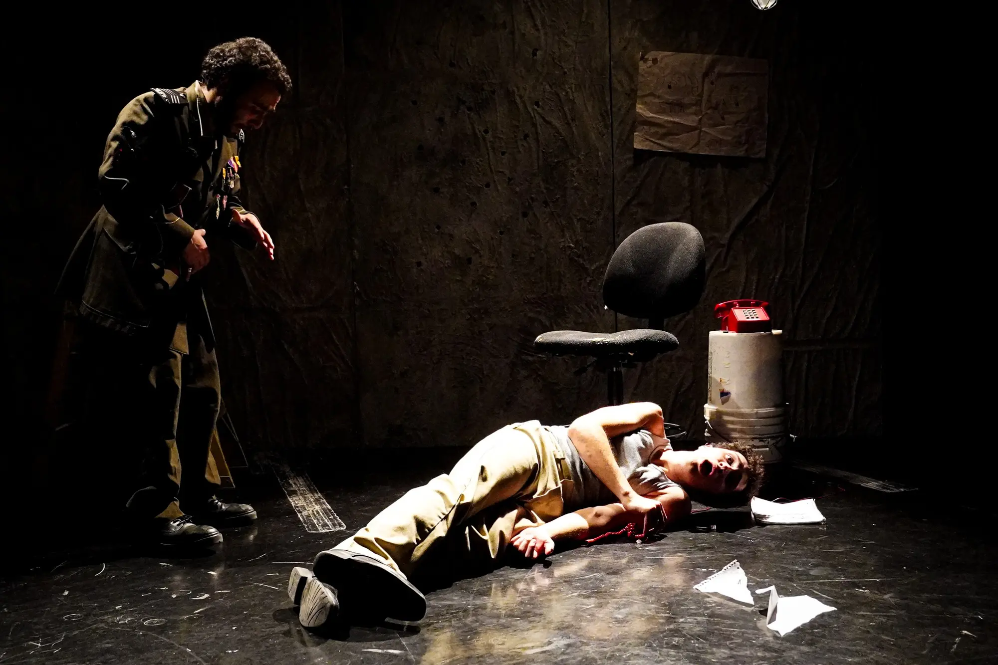 The general stands over his fallen servant